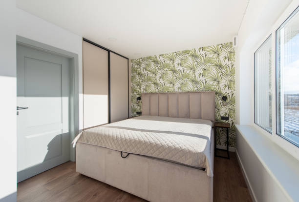 istock Bedroom Interior. Beautiful Sunlight. King Size Bed and Windows. 2152753534