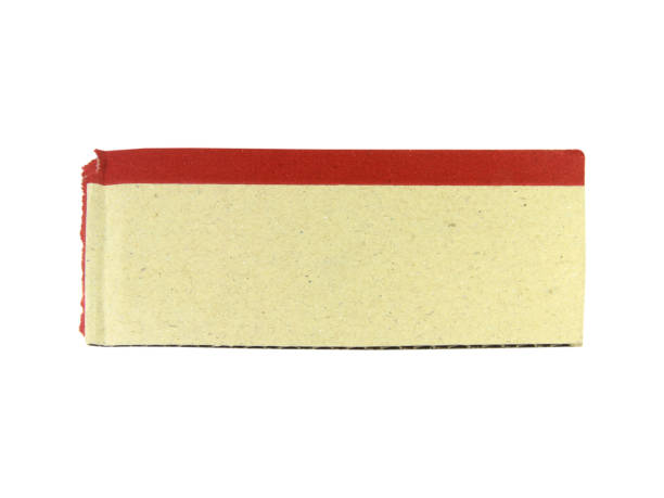 istock small piece of brown paper cut edge element isolated on white background.Clipping path. 2152754143