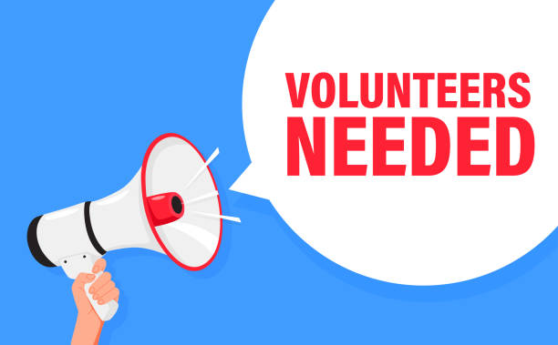istock Volunteers needed. Hand hold megaphone speaker for announce. Attention please. Shouting people, advertisement speech symbol 2152755328