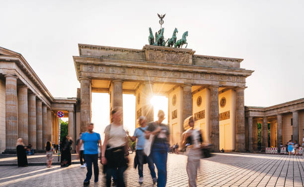 istock Sunset Glow at Brandenburg Gate with Blurry Pedestrians 2152755430