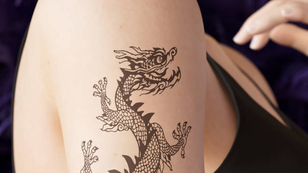 istock Tattoo permanence: layers of human skin, needles and tattoo inks 2152756007