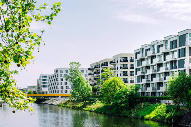 istock Modern Apartment Buildings Beside a Tranquil River in Berlin 2152760104