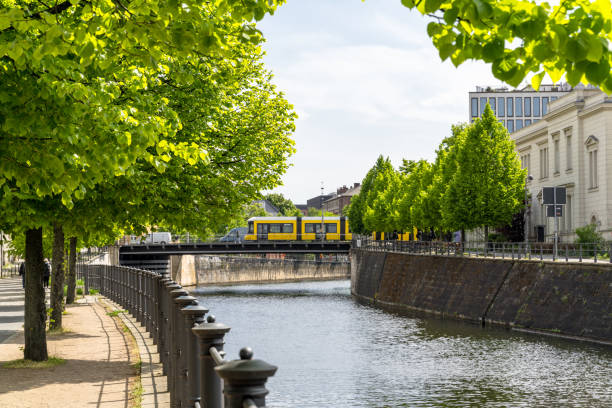 istock Spring Day in Berlin: Yellow Tram by the Riverside 2152763896