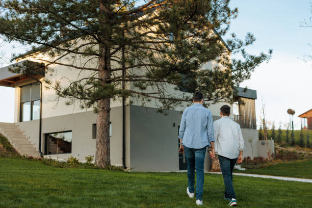 istock Gay couple arrive home. 2152764233