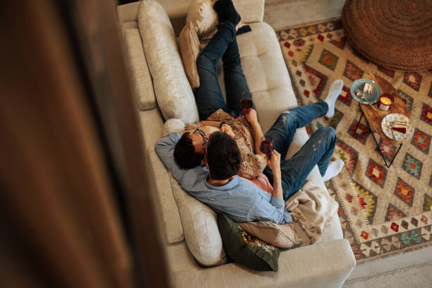istock Joyful gay couple at home. 2152764275