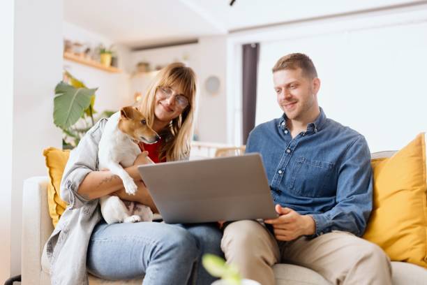 istock Couple doing online shopping at home 2152766350