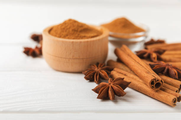 istock Cinnamon sticks and anise on a textured background. Cinnamon roll and star anise. Spicy spice for baking, desserts and drinks. Fragrant ground cinnamon.Place for text. copy space. 2152766823