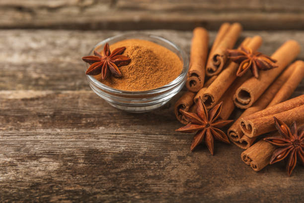 istock Cinnamon sticks and anise on a textured background. Cinnamon roll and star anise. Spicy spice for baking, desserts and drinks. Fragrant ground cinnamon.Place for text. copy space. 2152766890