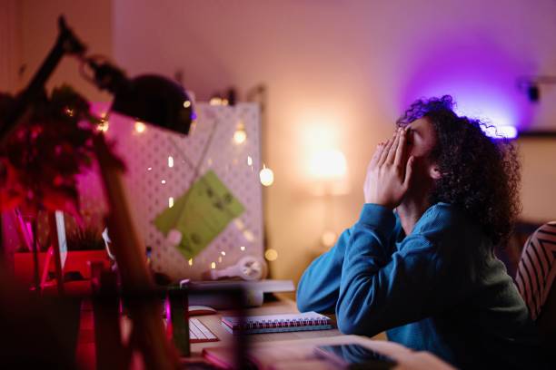 istock Teenage boy studying at home 2152767320