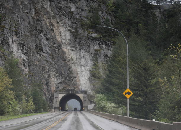 Hells Gate Tunnel, Canada - April 28, 2024: Looking south on the Trans-Canada Highway or Highway 1 through Hells Gate Tunnel. Spring afternoon in the Coast Mountain Range.