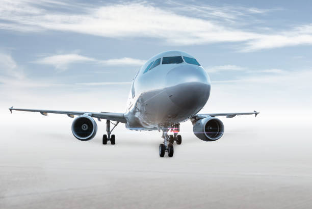 istock Passenger aircraft isolated on bright background with sky 2152782654