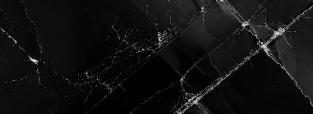 istock Dark damaged folded black cardboard with creases and defects 2152783326