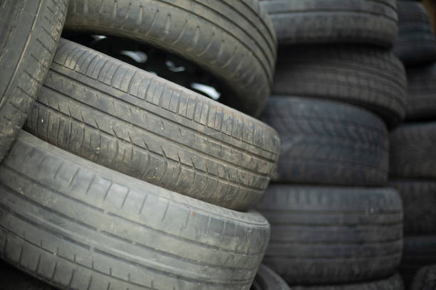 Tires. Old wheels. Tires in a landfill. Rubber Wheels.