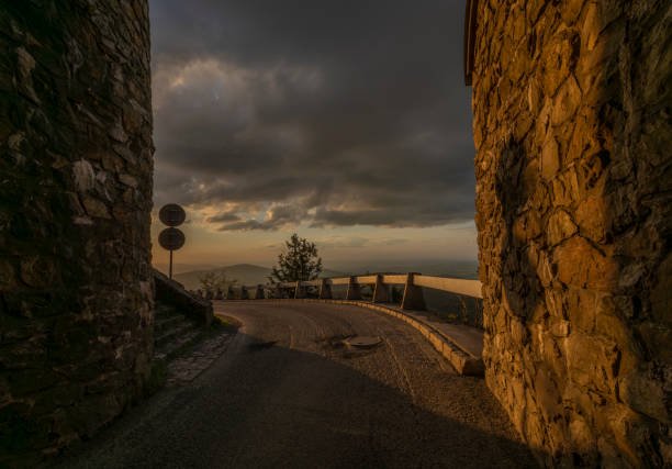 View from Jested hill on spring fresh landscape with color sunset and asphalt road down to Liberec city
