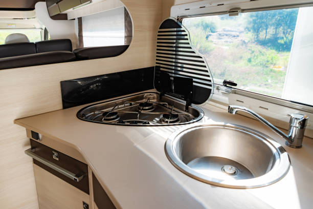 istock Small kitchen integrated into the interior of a caravan 2152789711