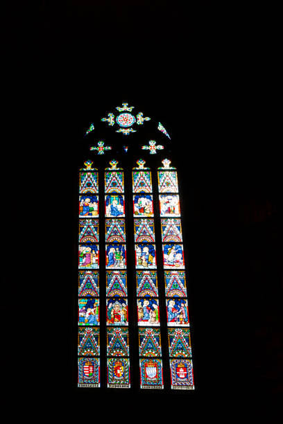 istock Beautiful stained glass window in many colours pattern in a Cathedral interior window wall in Budapest, Hungary 2152795458