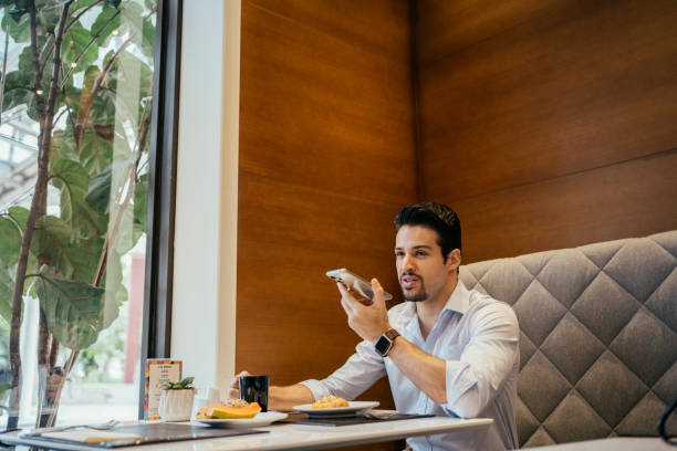 Business man having breakfast at hotel
