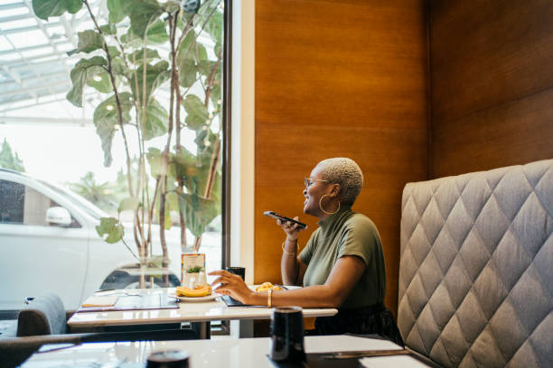 istock Business woman having breakfast at hotel 2152797655