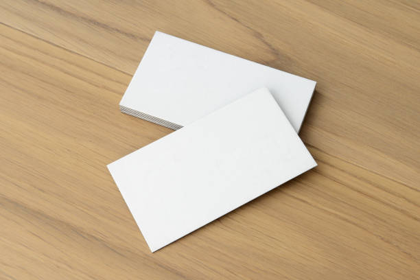 istock White business card on wood table background 2152797685
