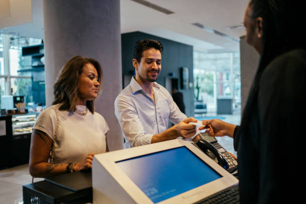 istock Business couple making payment at hotel 2152797698