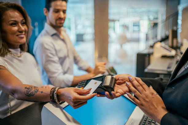 istock Business couple making payment at hotel 2152797718