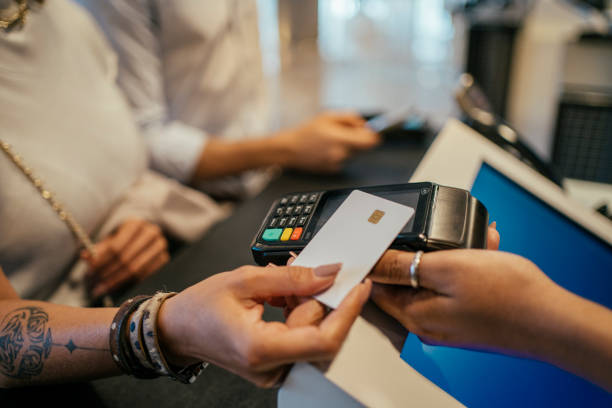 istock Business couple making payment at hotel 2152797721