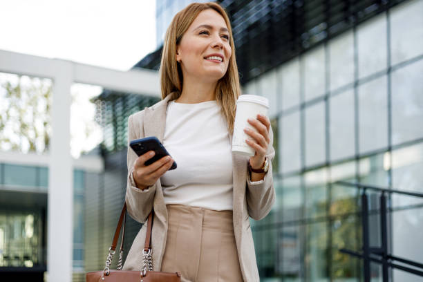 istock Elegant entrepreneur embraces technology and coffee on the go 2152797961