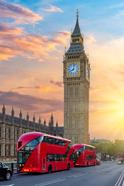 istock Big Ben tower and double-decker buses on Westminster bridge at sunset, London, UK 2152798391