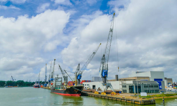 istock Harbor Cranes and Ship Port Rotterdam Netherlands 2152798546