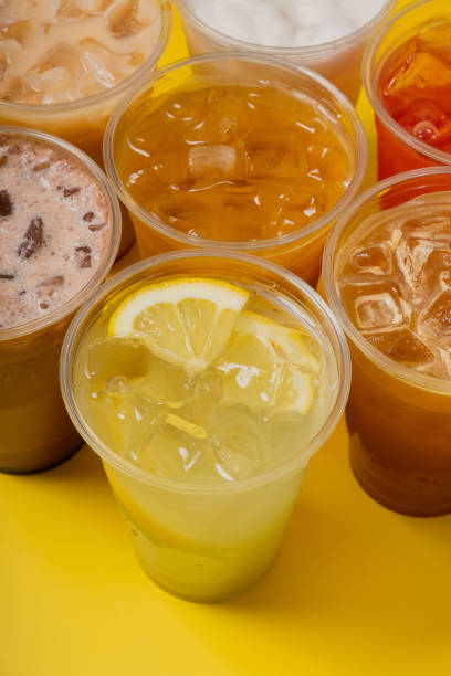 istock Colourful summer drinks with close-up. Lemonades and coctails on yellow background 2152802253