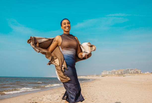 istock Beautiful diverse woman enjoying down time on a beach holiday 2152803126