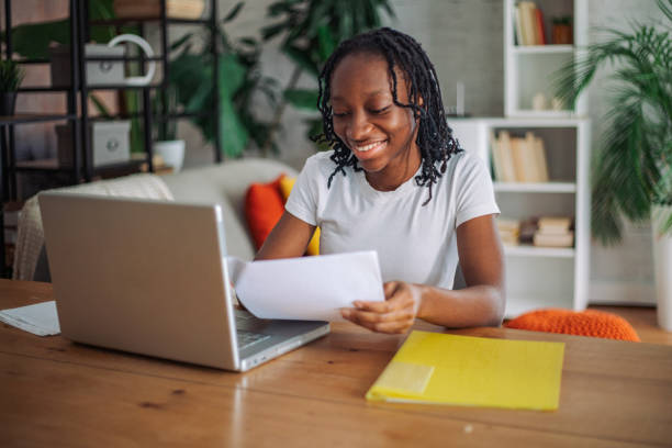 istock Professionally engaged woman at desk 2152803783