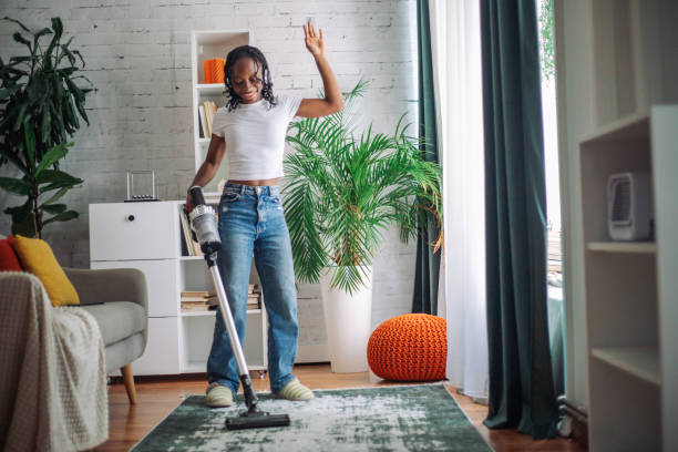 istock Individual cleaning with vacuum in modern home 2152805315