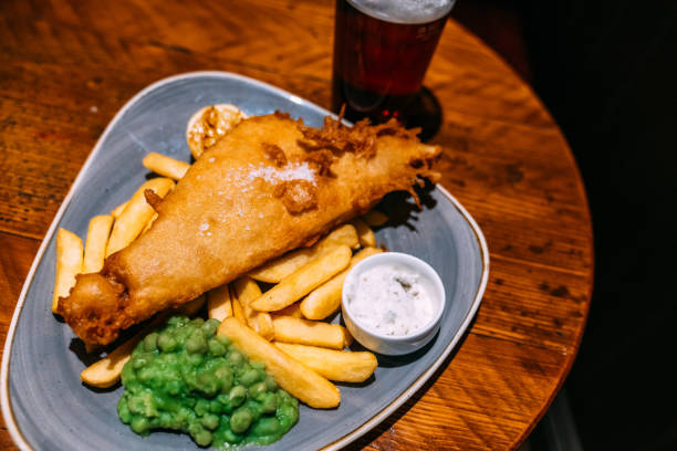 istock Plate of Fried Fish and Chips Served in an English Pub 2152805506
