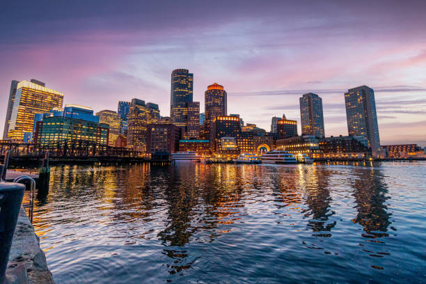 istock Illuminated Boston Harbor and Skyline with Vibrant-Colored Sunset 2152805520