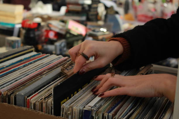 istock hand holding record in antique market 2152808498