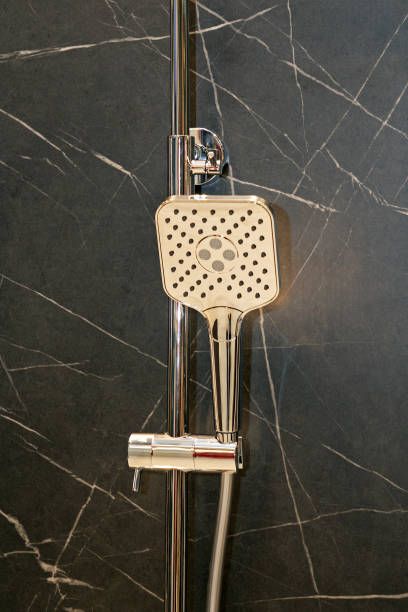 istock Shower spray hanging in bathroom 2152812859