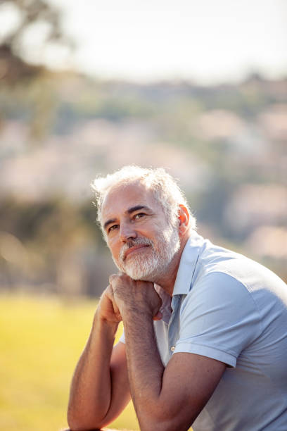 istock Middle age man portrait outdoors looking at view 2152814601