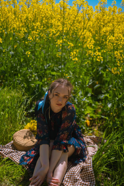 istock Handmade bag advertisement, showcasing regional crafts passed down through generations, featured in a field picnic with a girl. 2152815425