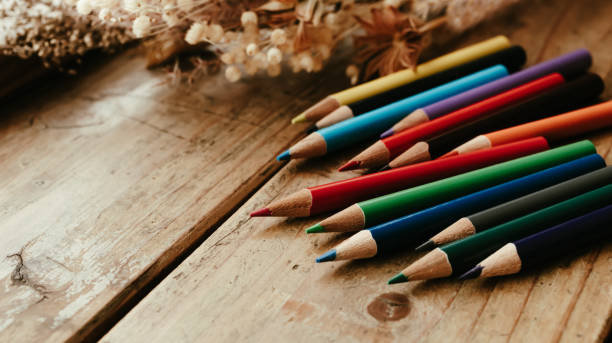 istock Colored pencils on a wooden desk. 2152816470