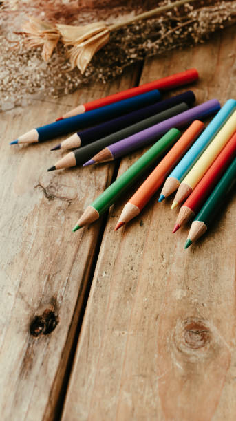 istock Colored pencils on a wooden desk. 2152816478