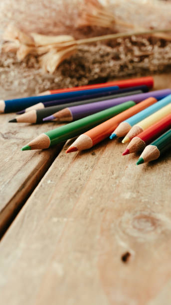 istock Colored pencils on a wooden desk. 2152816479