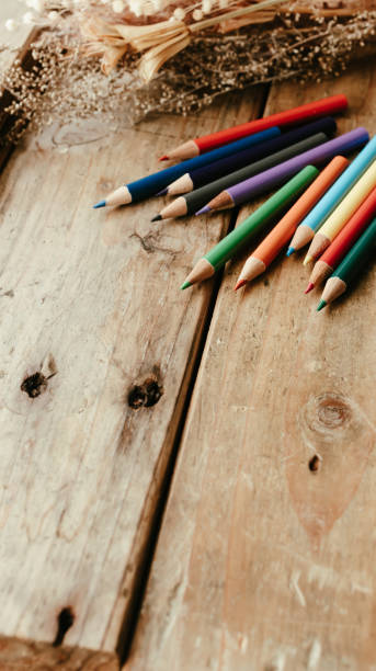 istock Colored pencils on a wooden desk. 2152816480