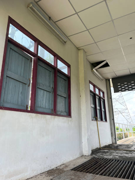 istock wooden window on cement wall 2152817683