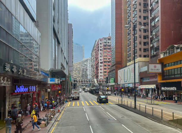 Hong Kong - February 20, 2024 : General view of Nathan Road in Mong Kok, Kowloon, Hong Kong. The road was named Nathan Road in 1909, after Sir Matthew Nathan, the 13th Governor who served between 1904 and 1907.