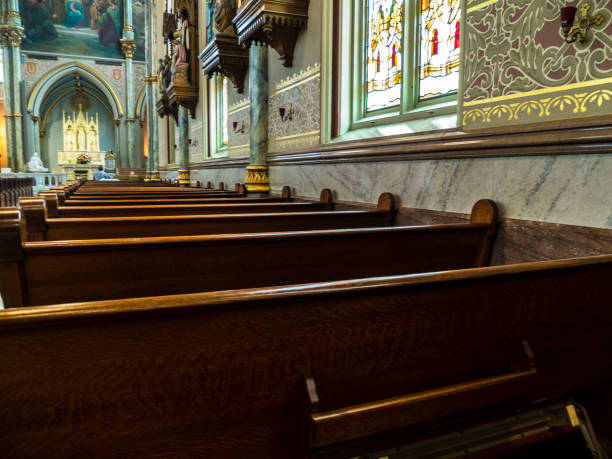 istock Church Benches With a Look At The Alter 2152819080