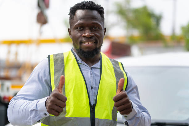 istock Happy construction worker with doing thumbs up gesture, Cheerful foreman worker on a construction site 2152821906
