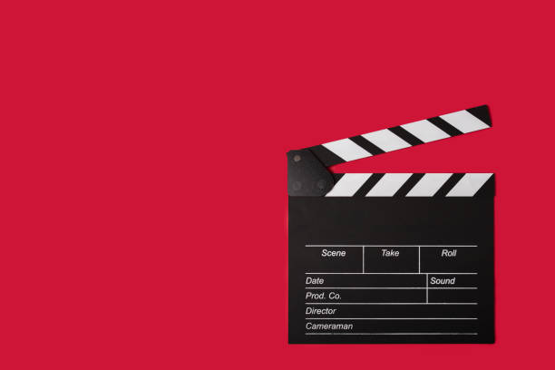 istock Cinema clapper board on a red background, copy space, movie, studio, motion. 2152822913