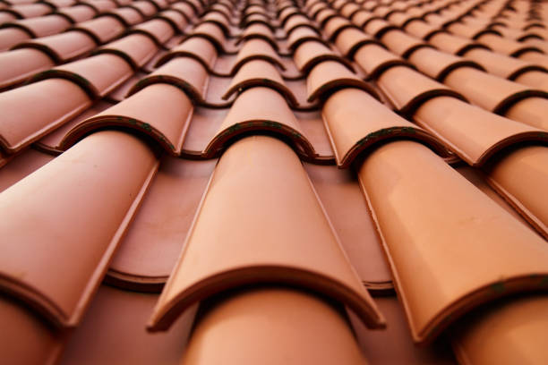 istock Red Ceramic Roof Tiles Pattern on Building 2152823053