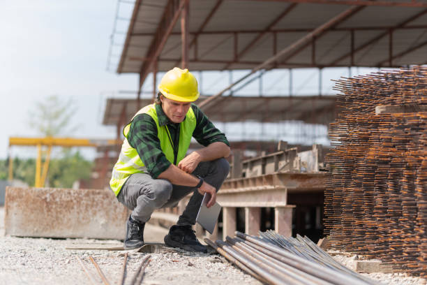 istock Engineer man checking inventory in the precast factory site, Foreman worker at construction site 2152823863